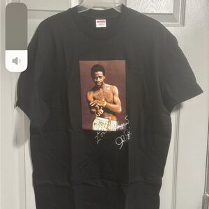 Supreme Black Graphic Tee with Iconic Print